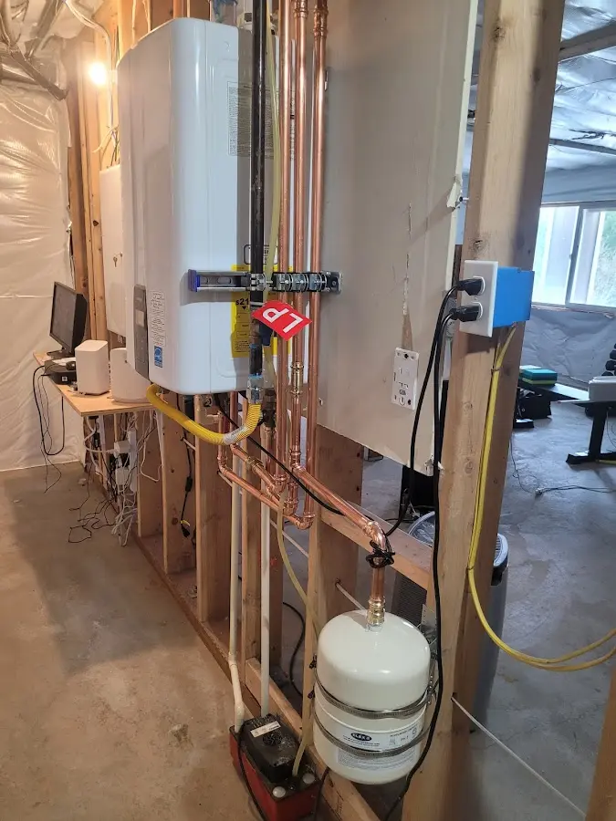 Licensed plumber repairing a kitchen sink in Hurst