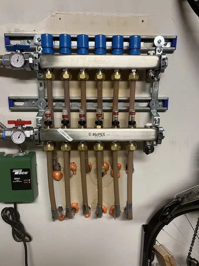 Plumber performing Water Heater Repair at a residential property in Hurst